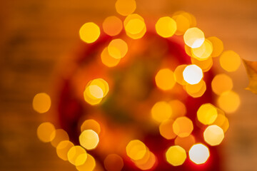 defocused garland for christmas and various holidays in red and orange