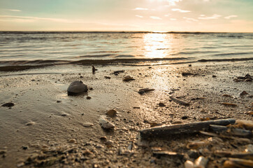 Sunset on the stand of Blåvand Denmark. Evening hours in warm light mood