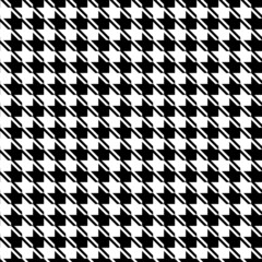 Goose foot or broken cage. Two-color geometric ornament. Abstract polygons.Trendy seamless pattern for modern fabrics, textiles, decorative pillows, wrapping paper. White and black. 