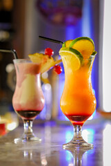 Colorful cocktail drinks at the bar counter.