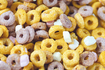 Multi colored fruit loops background. Close up