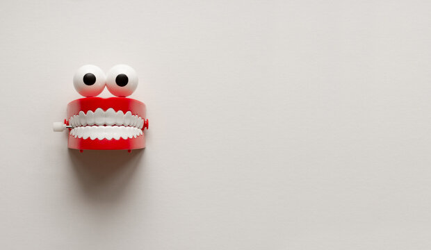 Eyes and teeth toy on white background