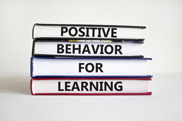 Positive behavior for learning symbol. Concept words Positive behavior for learning on books on a...