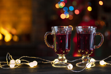 Christmas Eve Party Table. Fireplace and Christmas tree, treats, warmth, cozy family hearth