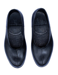 Fototapeta na wymiar Black rubber farmer shoes