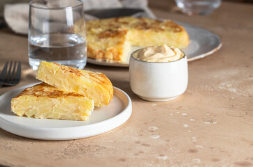 Tortilla, spanish omelette made with eggs and potatoes and traditionally served with mayonnaise.