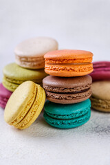  stack of colorful macaroons on white background