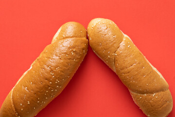 Fresh rolls on a red background