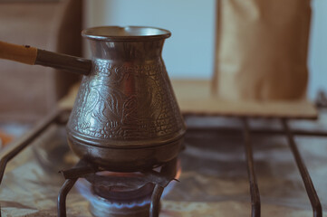 Turkish coffee pot on an open fire