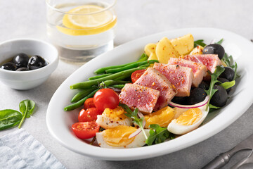 nicoise salad with fresh tuna, french cuisine