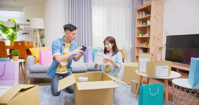 couple open delivery boxes