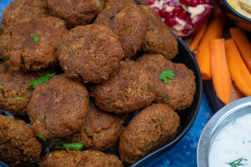 Falafel close up in black bowl