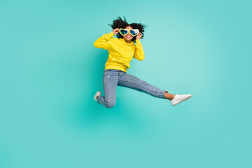 Fototapeta na wymiar Full length body size view of attractive cheerful funny girl jumping wearing specs isolated over bright teal turquoise color background