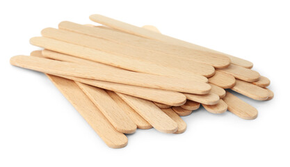 Disposable wooden spatulas for depilatory wax on white background