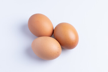 fresh chicken eggs on a white background