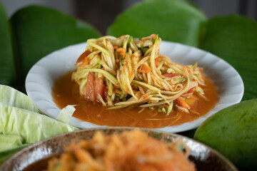 Papaya Salad with Mango Noodles, a popular Thai street food.