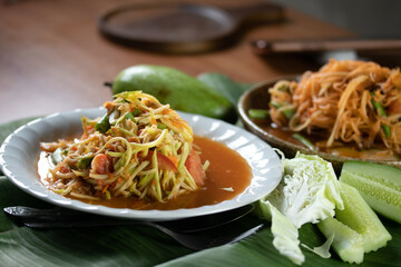 Papaya Salad with Mango Noodles, a popular Thai street food.