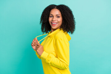 Photo portrait woman laughing wearing yellow clothes isolated vivid turquoise color background