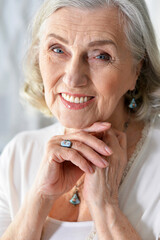portrait of happy senior woman at home
