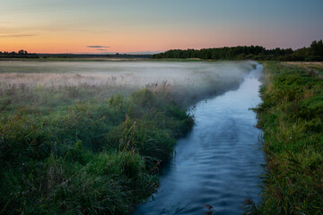 Fog over the meadow by the Uherka river, Czulczyce, Poland