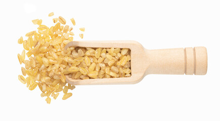 bulgur groats in a wooden scoop isolated on white