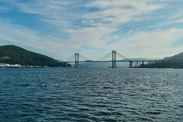 Fototapeta premium Bridge of Rande in Vigo, Spain, photo taken from a boat on the sea