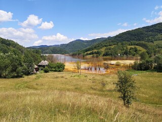 Artificial lake formed in Geamana Village, Alba county, Romania, for depositing the toxic waste from a mine operation near Rosia Montana.