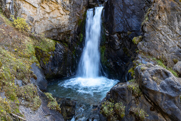 Kairak Waterfall is 55-meter (180 ft) high waterfall in Ile-Alatau National Park, Kazakhstan. The source of the river is located in the glaciers of the central part of the Zailiysky Alatau ridge.