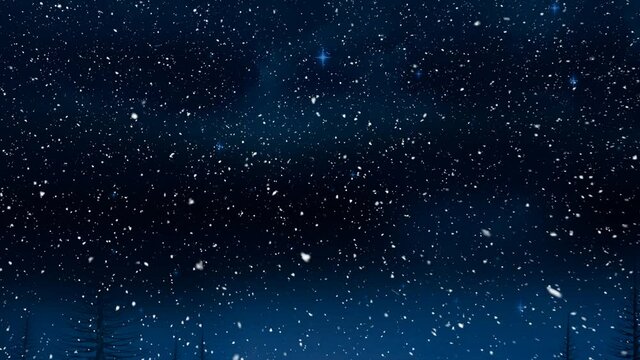 Snow falling against shining blue stars in the night sky