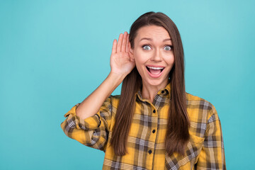 Photo of amazed astonished lady hand palm near ear open mouth look camera isolated on blue color...