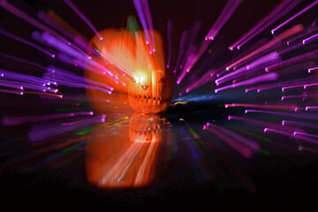toy jack-o-lantern zoomed during exposure