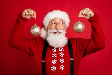 Photo of cheerful santa happy positive smile hold balls tree decor toy christmas time spirit...