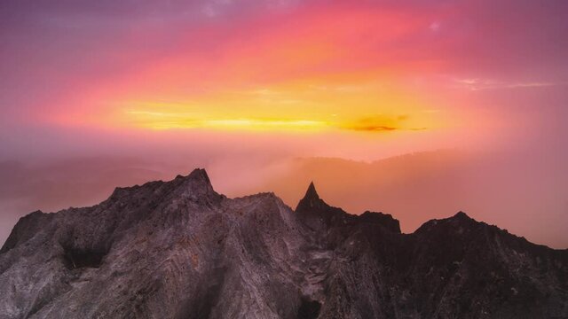 Time lapse video 4k, Doi Pha Phueng viewpoint Beautiful on rock of morning scenery Golden light sunrise And the mist flows on high mountains, Wonder fog. Baan Pang puai, Mea Moh Thailand.