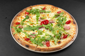 pizza with salami and tomatoes