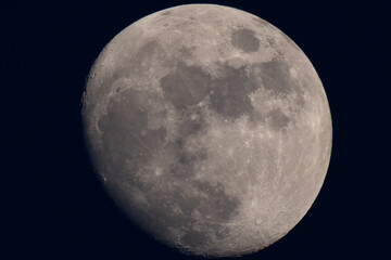 Moonlight yellow gold in the night time.Night landscape and space background.The moon in dark sky at midnight.Beautiful fantasy nature landscape at night scene background.