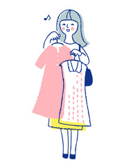 洋服を選んでいる若い女性