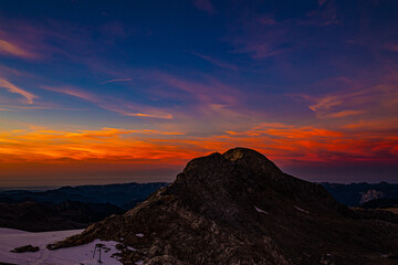 Summer sunset in the Alps at the top of Dachstein 3000 m.