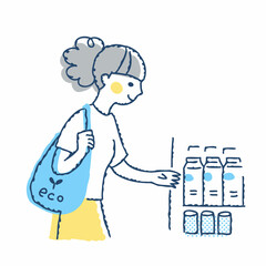 エコバッグを持って買い物をしている若い女性