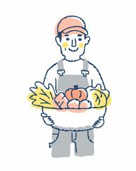 収穫した野菜を持っている農家の男性