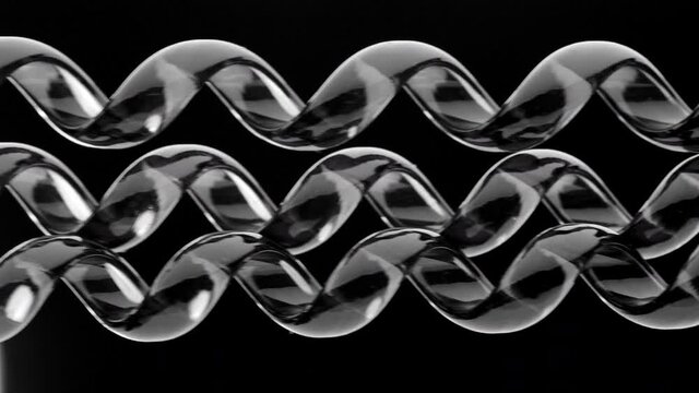 Springs are compressed and expanded against a black background.
