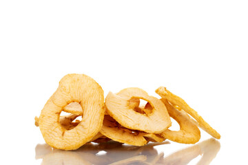 Several organic apple chips, close-up, isolated on white.