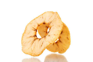 Several organic apple chips, close-up, isolated on white.