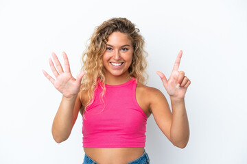 Fototapeta premium Girl with curly hair isolated on white background counting seven with fingers