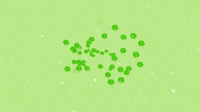 Animation of lucky clover over green background