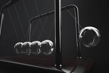 Close-up of Newton's cradle in action