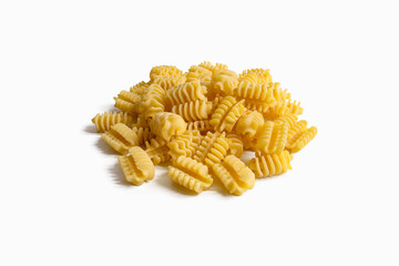 raw pasta radiatori isolated on white background