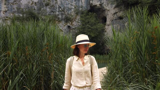Attractive girl walking in a national park in Croatia