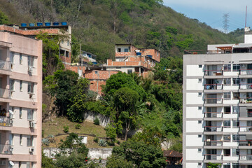 Fototapeta premium urban area with slums, simple buildings usually built on the hillsides of the city
