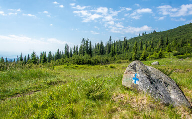 Hiking trails signs in the Carpathian mountains. Calimani Romania.