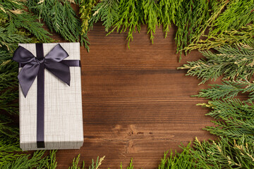 Christmas gift on wooden background. Christmas holiday celebration, new year concept. gift concept banner, background.